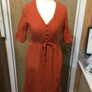 Unbranded eyelet rust colored dress with pockets elastic in sleeves size small
